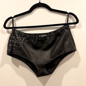 Black leather vintage Gianni Versace shorts.